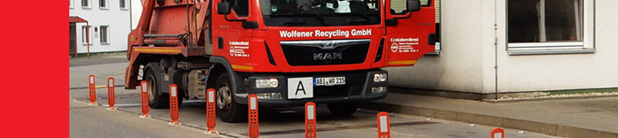Ein Containerfahrzeug auf der Waage